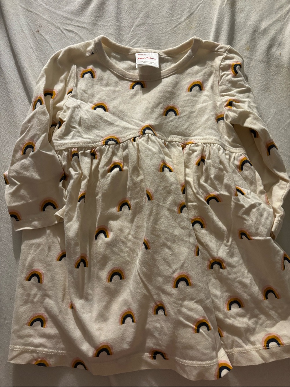 Hanna Andersson Cream Dress with Yellow & Black Rainbow Print